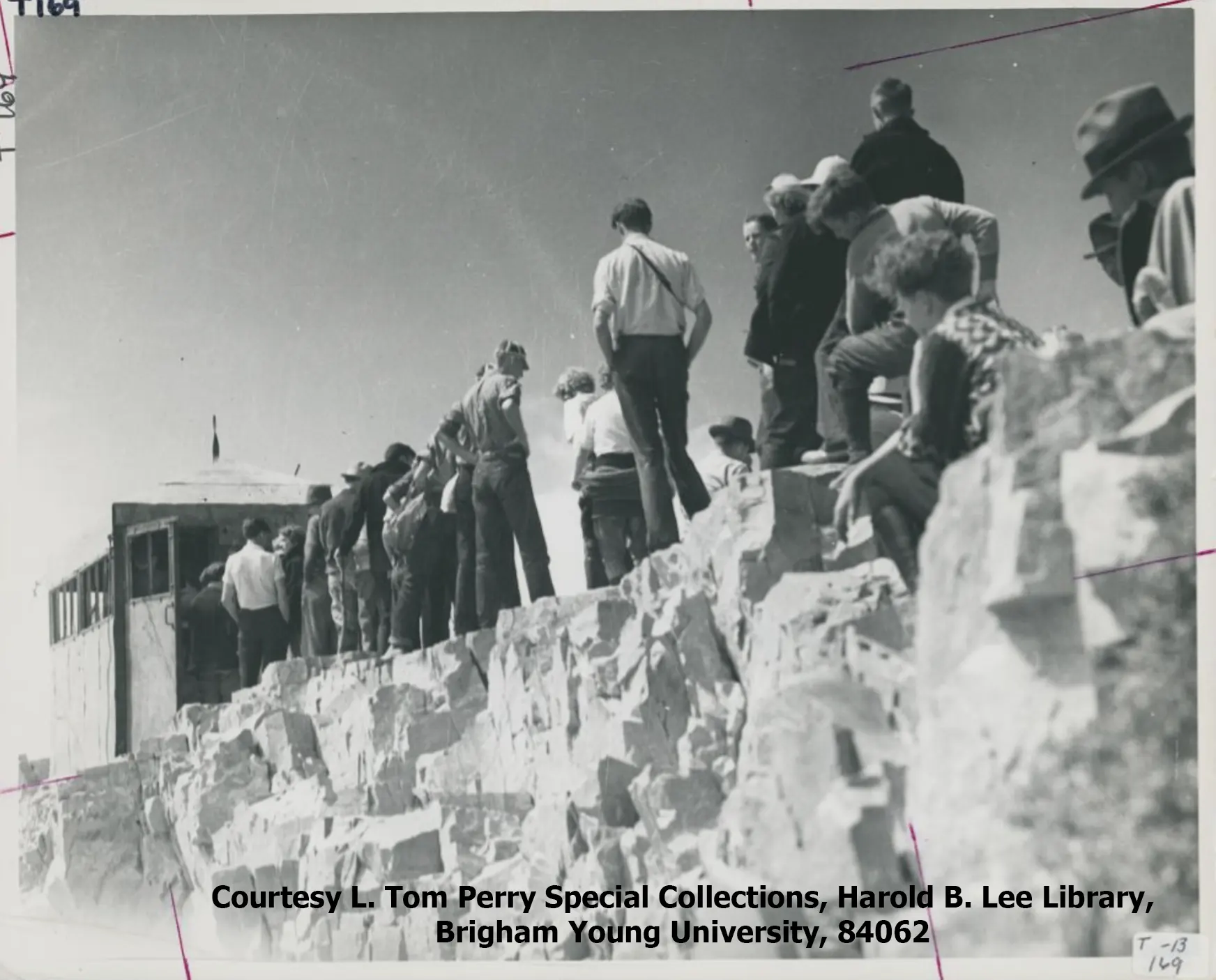 Hikers are shown lined up waiting to get into the Timp glass house